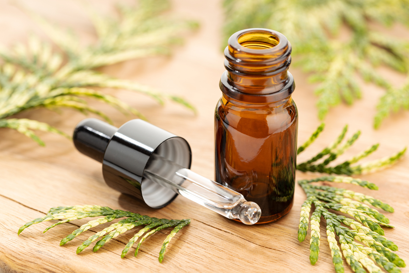 Bottle of Cypress Essential Oil with a Dropper